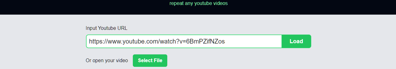Paste a YouTube URL into the input bar and click Load